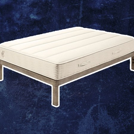 A Zinus mattress on a dark blue background