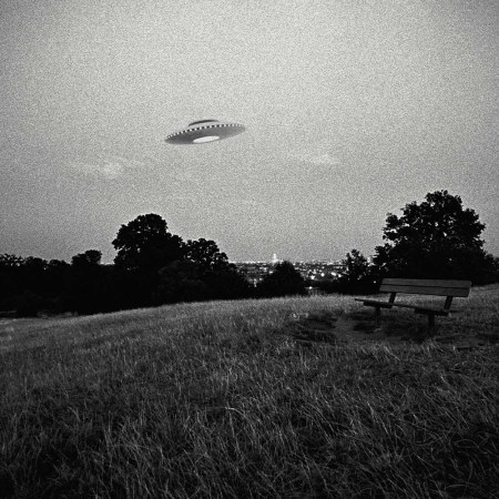 UFO in flight above urban park