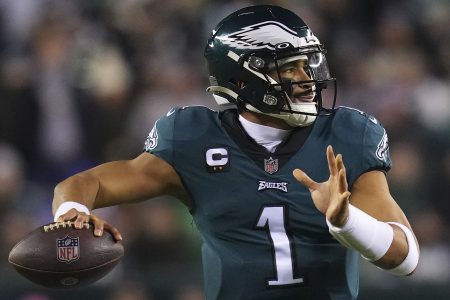Jalen Hurts of the Eagles passes the ball.