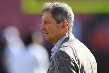 Ex-NFL quarterback Bernie Kosar on the field prior to a game.