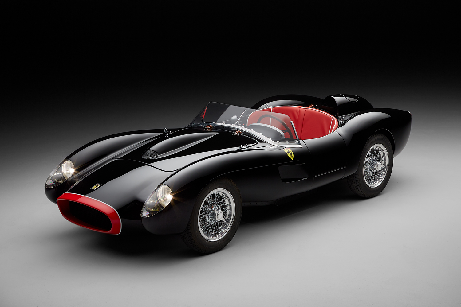 A black Ferrari replica from The Little Car Company, one of the pieces of automotive paraphernalia car collectors now spend tons of money on