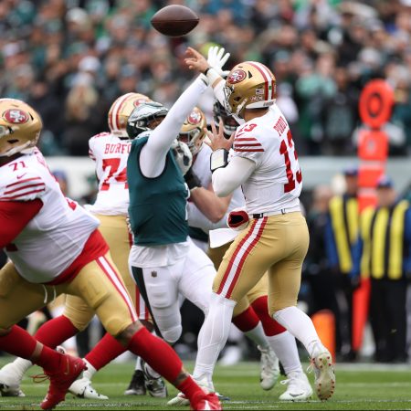 Brock Purdy attempts a throw against the Eagles.