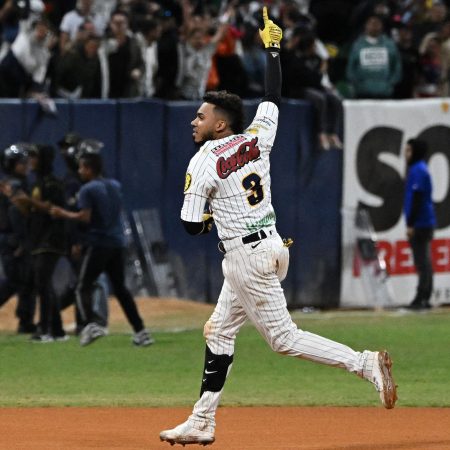 Harold Castro of Leones del Caracas reacts after hitting a home run.
