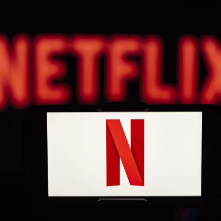 Streaming service Netflix, which is shown here in a photo illustration, released its new password-sharing rules for the U.S.
