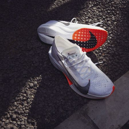 a pair of Nike Vaporfly 3 running shoes on a black and white background