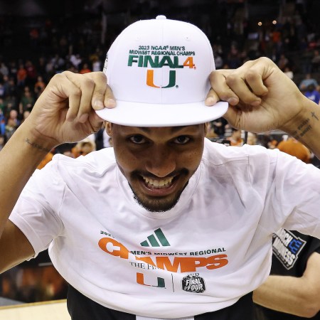 Harlond Beverly #5 of the Miami Hurricanes celebrates after defeating the Texas Longhorns 88-81 in the Elite Eight round of the NCAA Men's Basketball Tournament at T-Mobile Center on March 26, 2023 in Kansas City, Missouri.