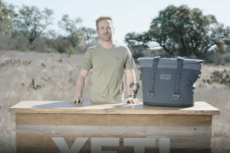 yeti employee talking about the Hopper M30 Charcoal cooler