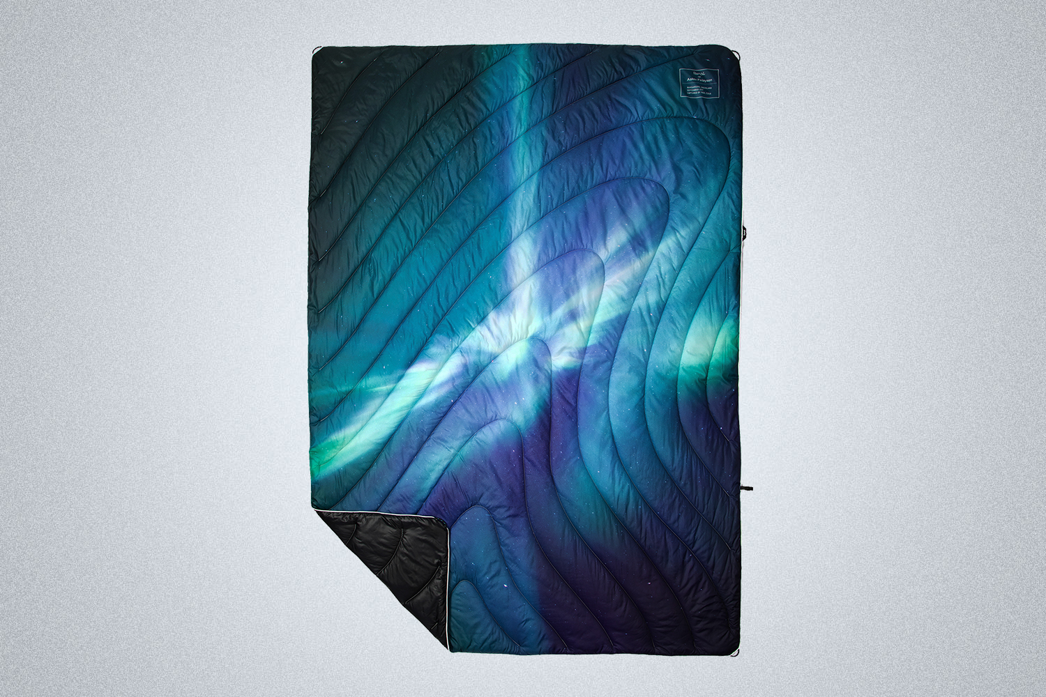 Askov Finlayson x Rumpl Northern Lights Puffy Blanket, now on sale