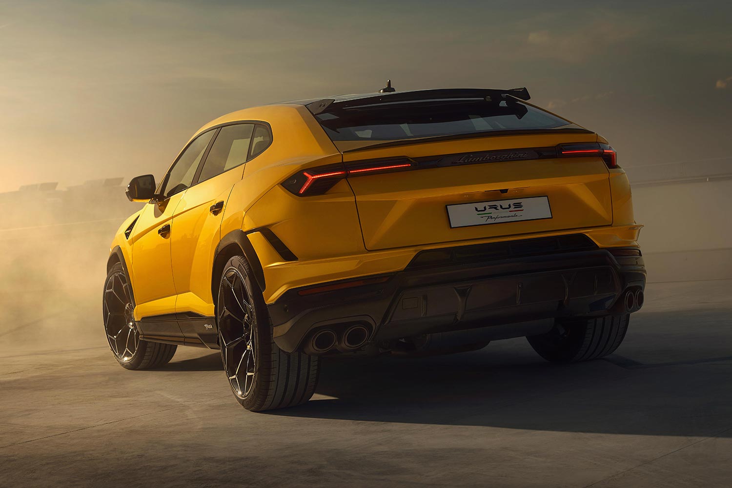 The rear end of a yellow Lamborghini Urus Performante super-SUV