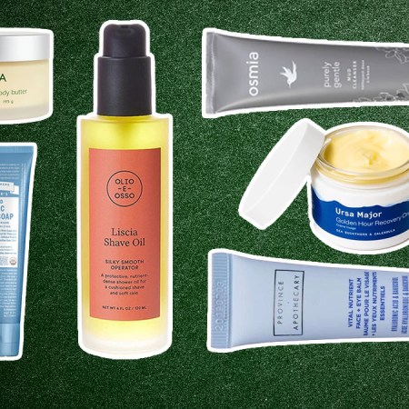 Clean skincare products on a green textured background