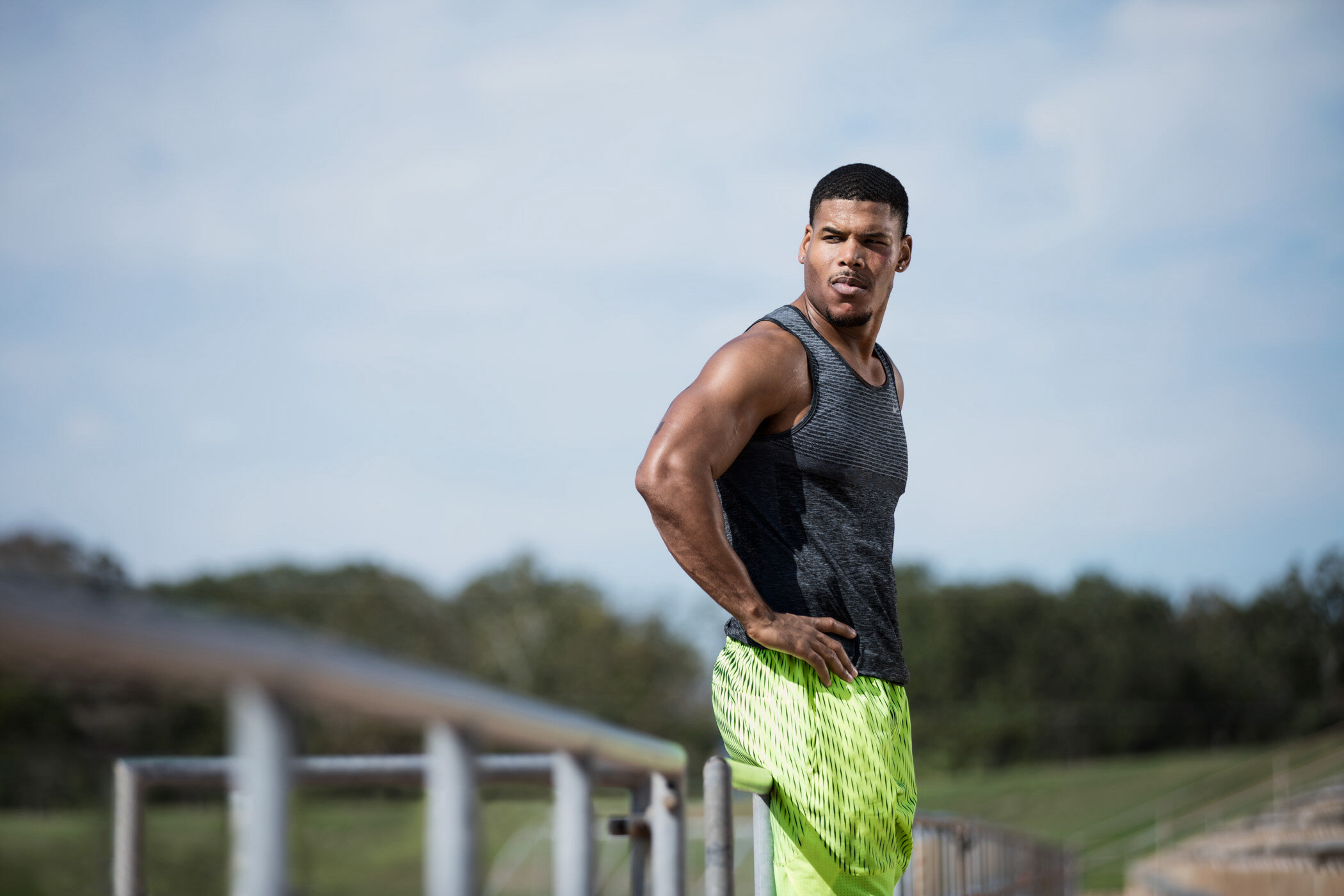 A photograph of fitness trainer Ron "Boss" Everline standing with his hands on his hips.