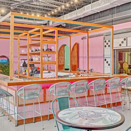 A bright pink-colored bar at Tropical Distillers in Miami, Florida