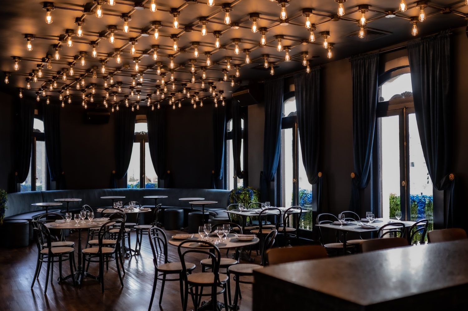 A wide shot of a dining room in a restaurant.