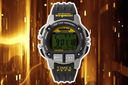 a Huckberry x Timex watch on a black and yellow background