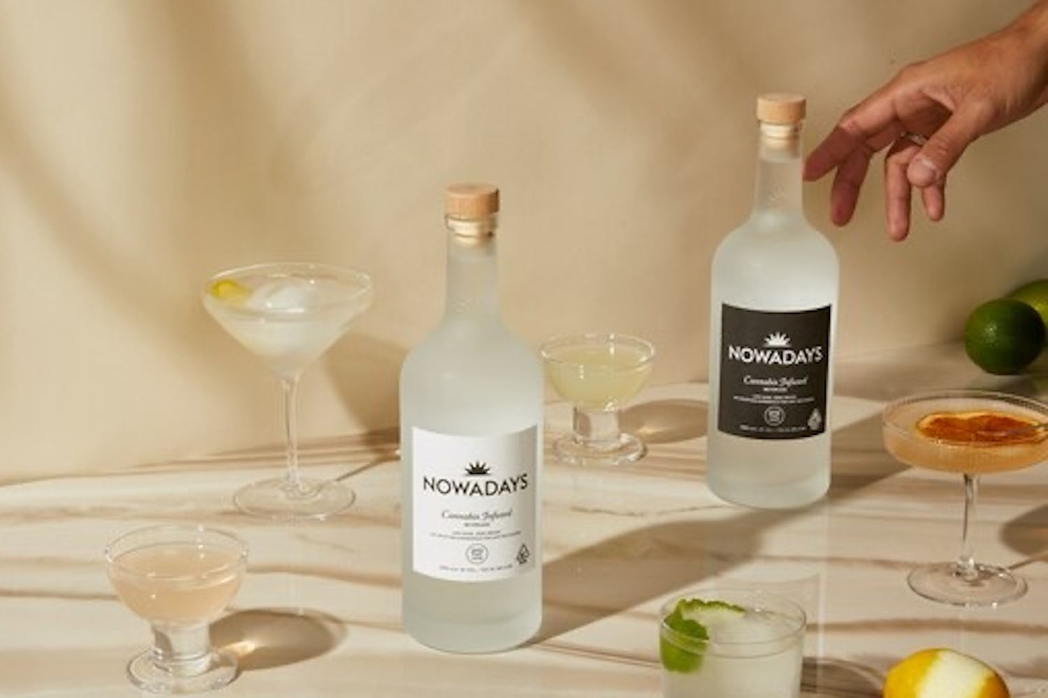 two bottle of Nowadays on a marble desk