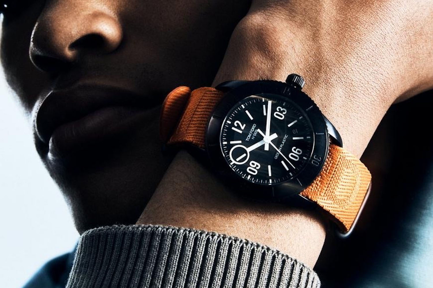 a model wearing the Tom Ford 002 Ocean Plastic Sport Watch