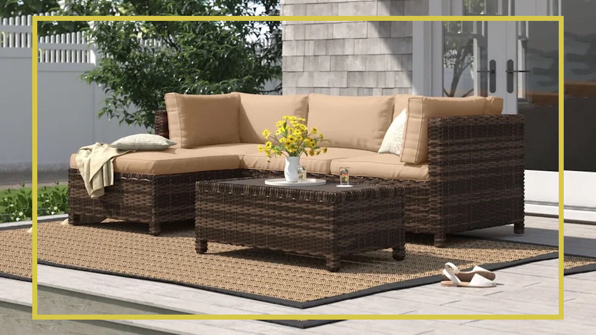 photo of a ratan backyard set from Wayfair on a patio