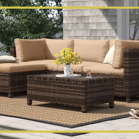 photo of a ratan backyard set from Wayfair on a patio