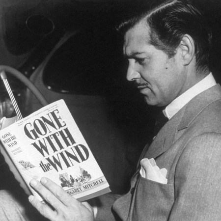 Clark Gable reading "Gone With the Wind."