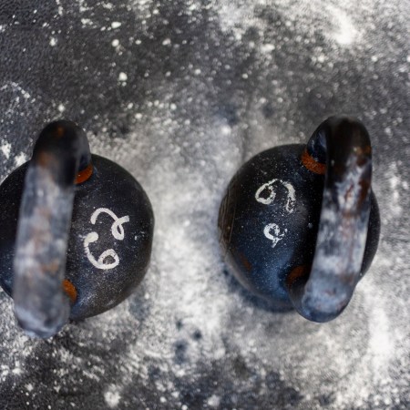 Two kettlebells on the floor.