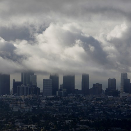 Storm clouds gather over the skyline of downtown Los Angeles, California, U.S.