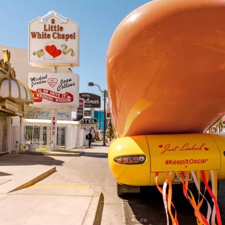 oscar mayer wienermobile parked outside the little white wedding chapel in las vegas