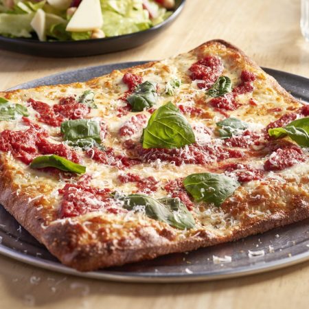 A plated pizza.
