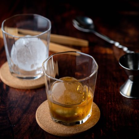 whiskey on the rock with perfect ice ball