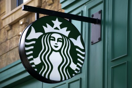 Starbucks sign outside of a store.