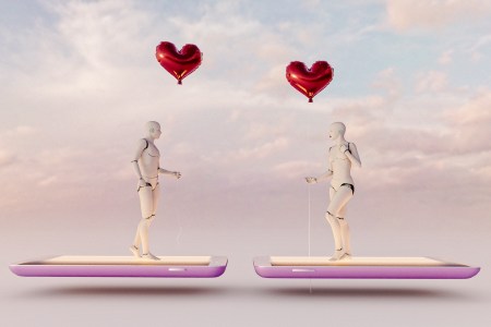 male and female artificial intelligences meet holding red balloons while standing on mobile phones