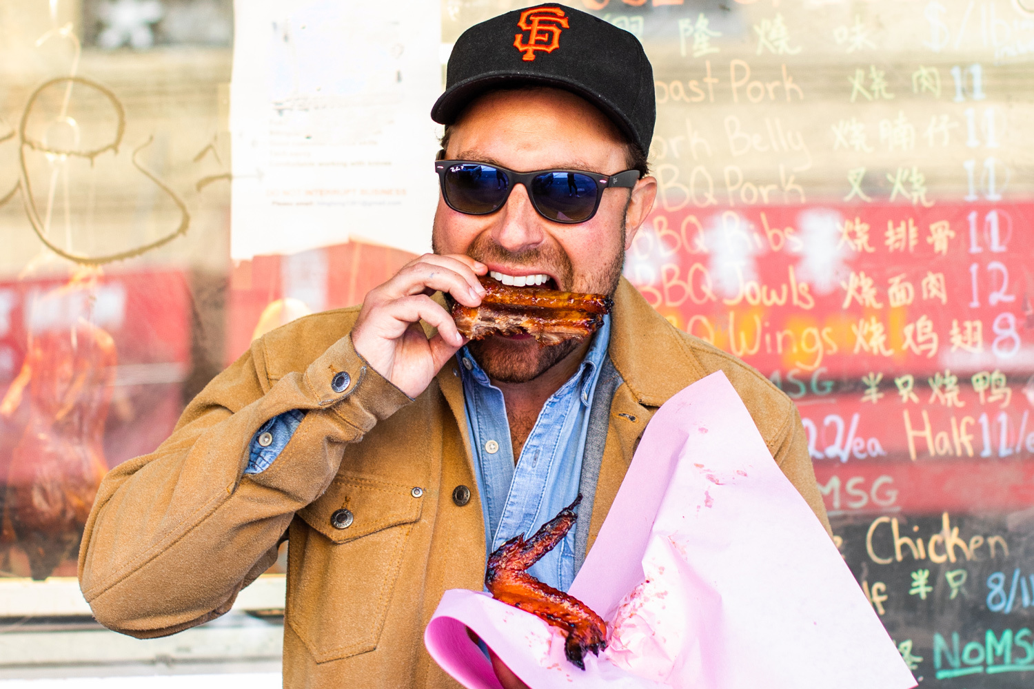 a photo of author matt moore eating ribs