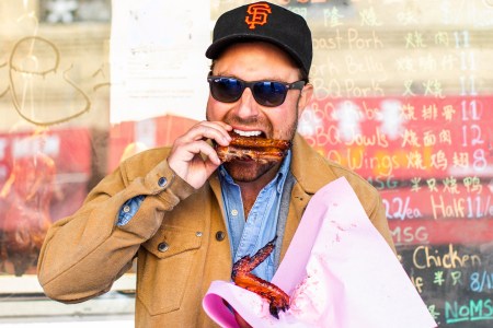 a photo of author matt moore eating ribs