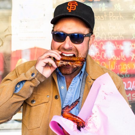 a photo of author matt moore eating ribs
