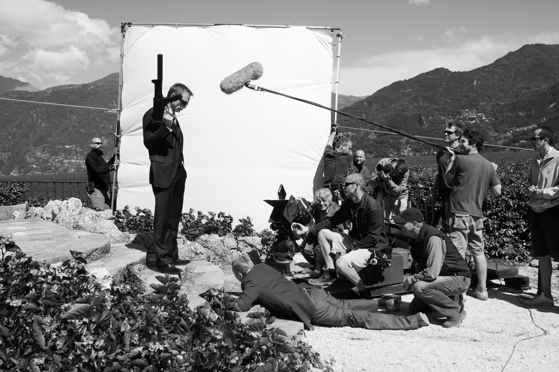 "I took this picture of Daniel Craig as they were filming <em>Casino Royale</em>. Daniel is standing there holding the gun and he’s got his sunglasses on, which will be removed before delivering the iconic 'Bond, James Bond' line for the first time. What I really like about this picture is how you can see the whole crew at work. The white reflector puts Daniel into a frame within a frame, which draws the eye to him."