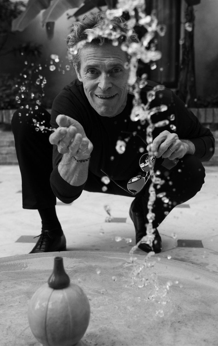 "I shot this picture of Willem Dafoe at the Venice Film Festival. I had a very short amount of time with him. We were in this hotel courtyard, which was very pretty but it didn’t really offer anything. Willem said, 'I get it. It all looks great, but it’s not what you want.' So we looked for something to do. And there was this little fountain and he said, 'Oh, I can play with this.' So he started playing with the water, flicking the water up at me. He completely soaked my trousers, so at the end of it I looked like I peed myself. But anyway, he’s throwing this water up in the air, and this is where you get happy accidents. He probably did it twenty times: splash, splash, splash. And this is the one picture that by far outshone all the others."