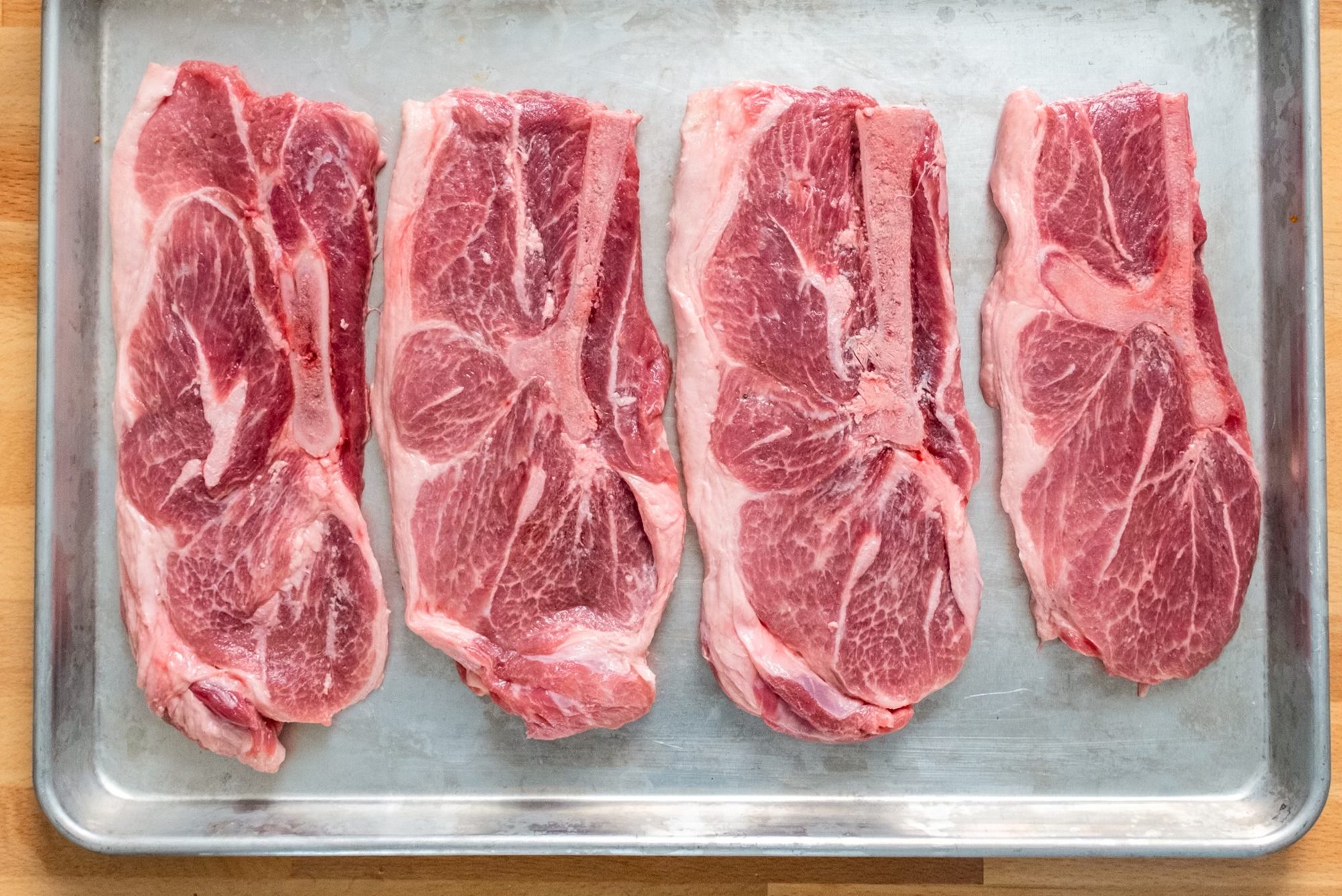 Porter Road's raw pork steaks.