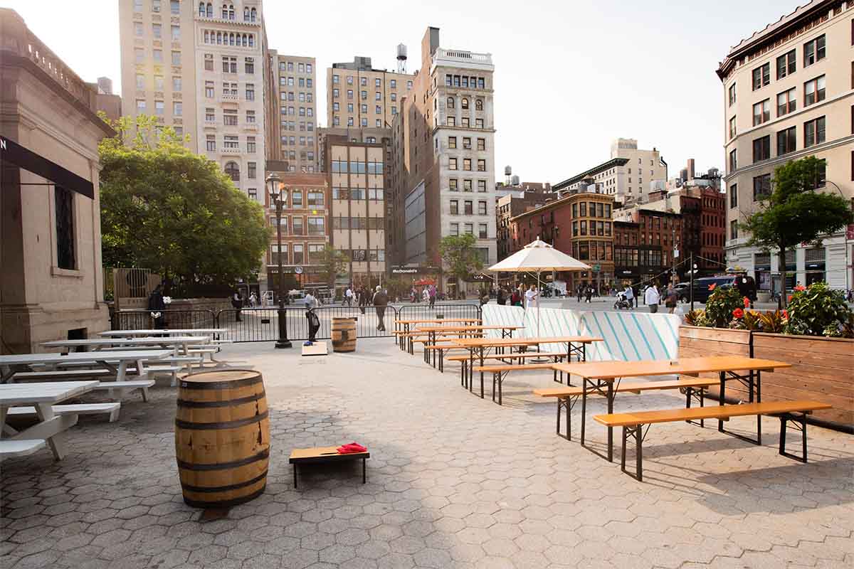 Torch & Crown outside in Union Square, with plenty of seating and lawn games