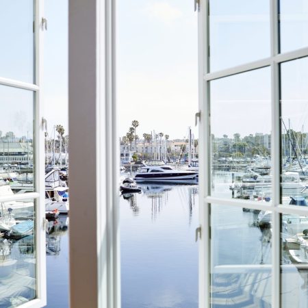 window view overlooking water and boats