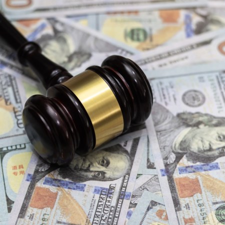 Auction gavel with money