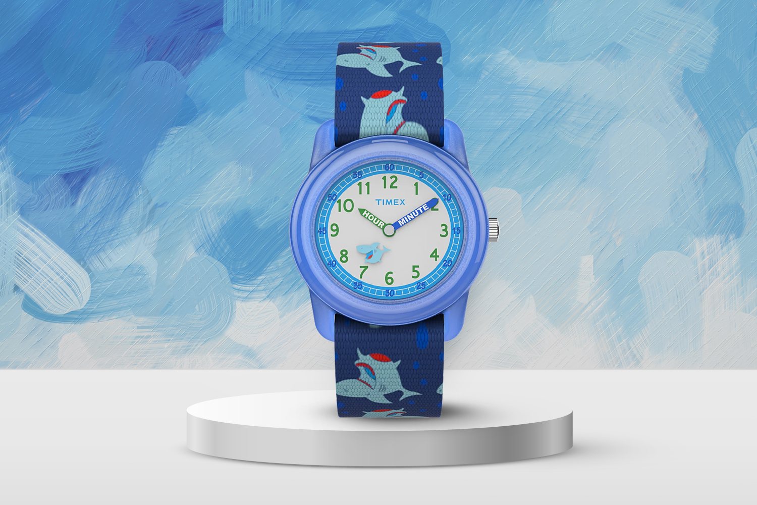 purple watch with band that has sharks on it and designated hour and minute hands on an analog clock