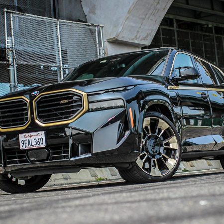 The 2023 BMW XM in black with gold-rimmed kidney grilles. Here's our full review of the SUV.