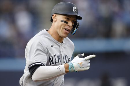 Aaron Judge of the Yankees runs out a home run against the Blue Jays.
