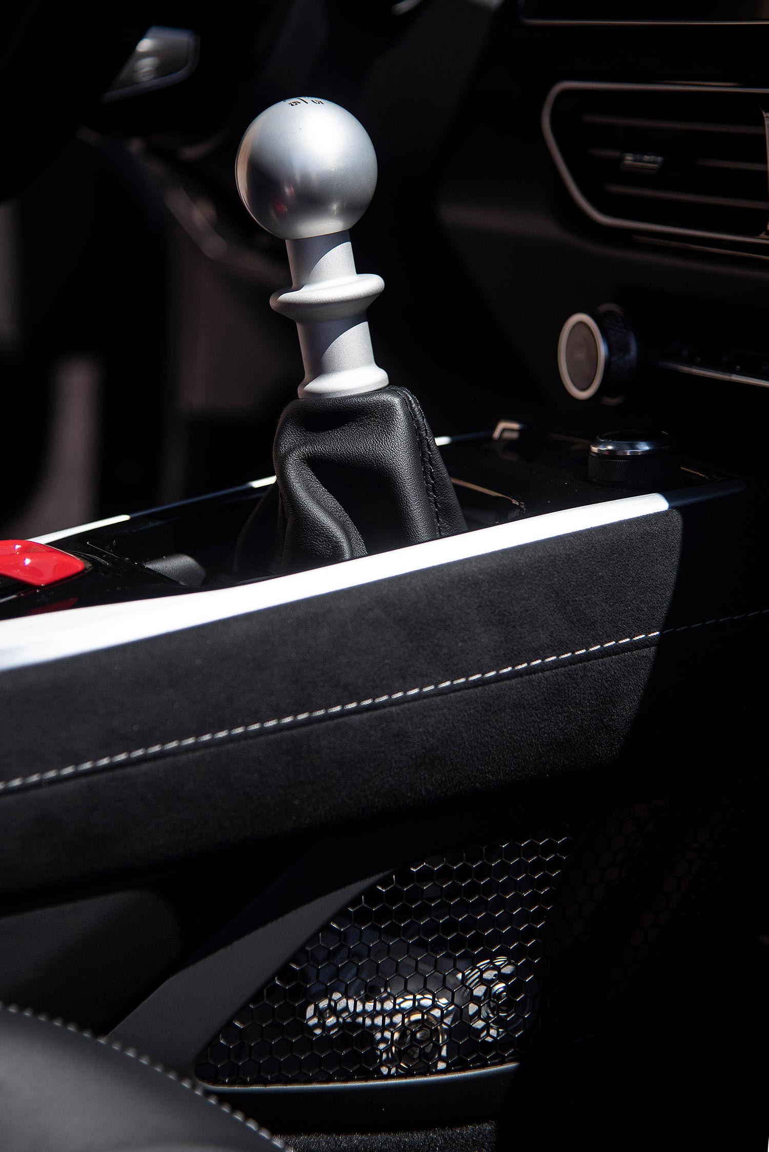 The aluminum shift knob in the manual Lotus Emira