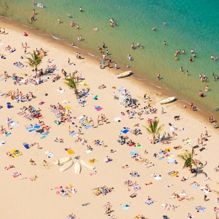 Swimmers and sunbathers at Oak Street Beach in Chicago, one of the best Chicago beaches on Lake Michigan