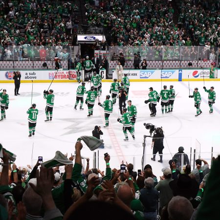Fans celebrate the Dallas Stars' win over the Seattle Kraken.