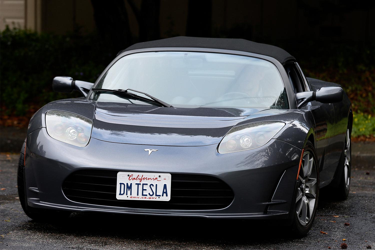 Dale Miller drives his Tesla Roadster in San Rafael, Calif. on Thursday, March 15, 2018. Miller's Roadster, number 1191 off the assembly line with the license plate DM TESLA, is the first of three Teslas he and his wife own.