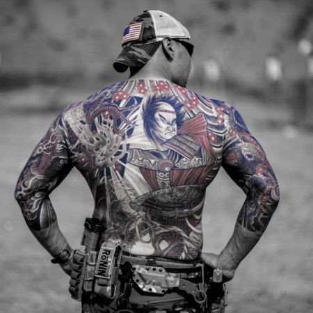 A shot of Tu Lam's intricate back tattoos.