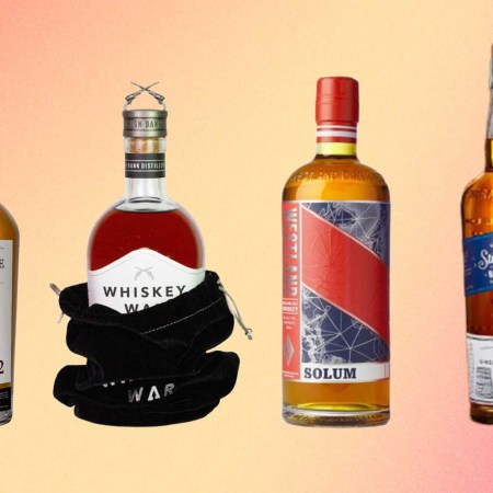 illustration of four bottles that earned top honors at the 2023 San Francisco World Spirits Competition