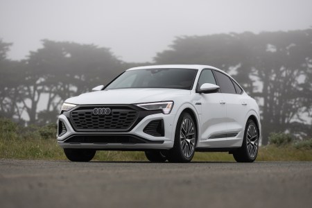 white Audi Q8 car on street on foggy day