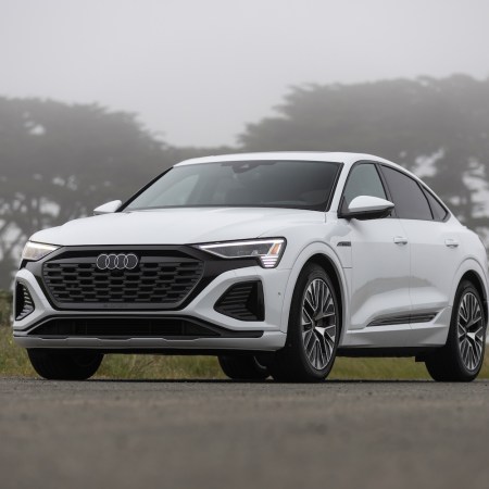 white Audi Q8 car on street on foggy day